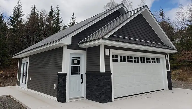 Professional team installing high-quality vinyl siding on a home in Edmonton for lasting protection.