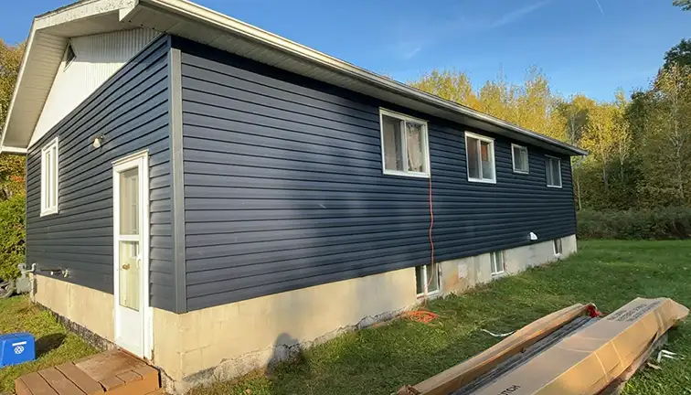 Before and after of vinyl siding installation in Edmonton, enhancing curb appeal and durability.